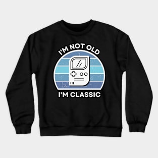 I'm not old, I'm Classic | Handheld Console | Retro Hardware | Vintage Sunset | '80s '90s Video Gaming Crewneck Sweatshirt